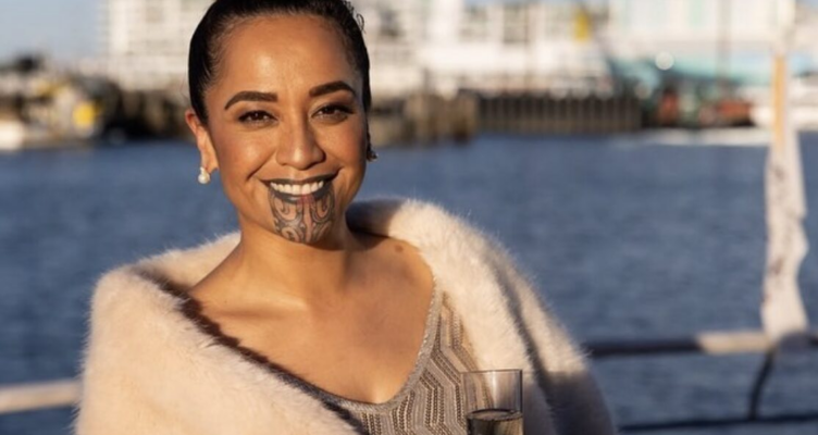 A TV presenter with a Māori face tattoo fires back at cruel trolls.