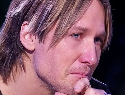 FANS RALLY AROUND KEITH URBAN AFTER HE ASKS THEM TO PRAY FOR HIM.